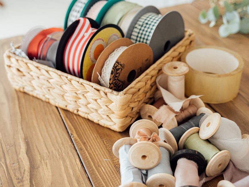 brown wooden woven basket with assorted color ceramic jars