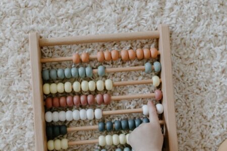 close up shot of a child playing abacus