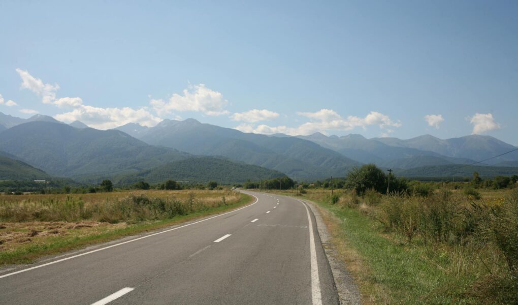 a road towards the mountains