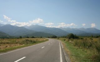 a road towards the mountains
